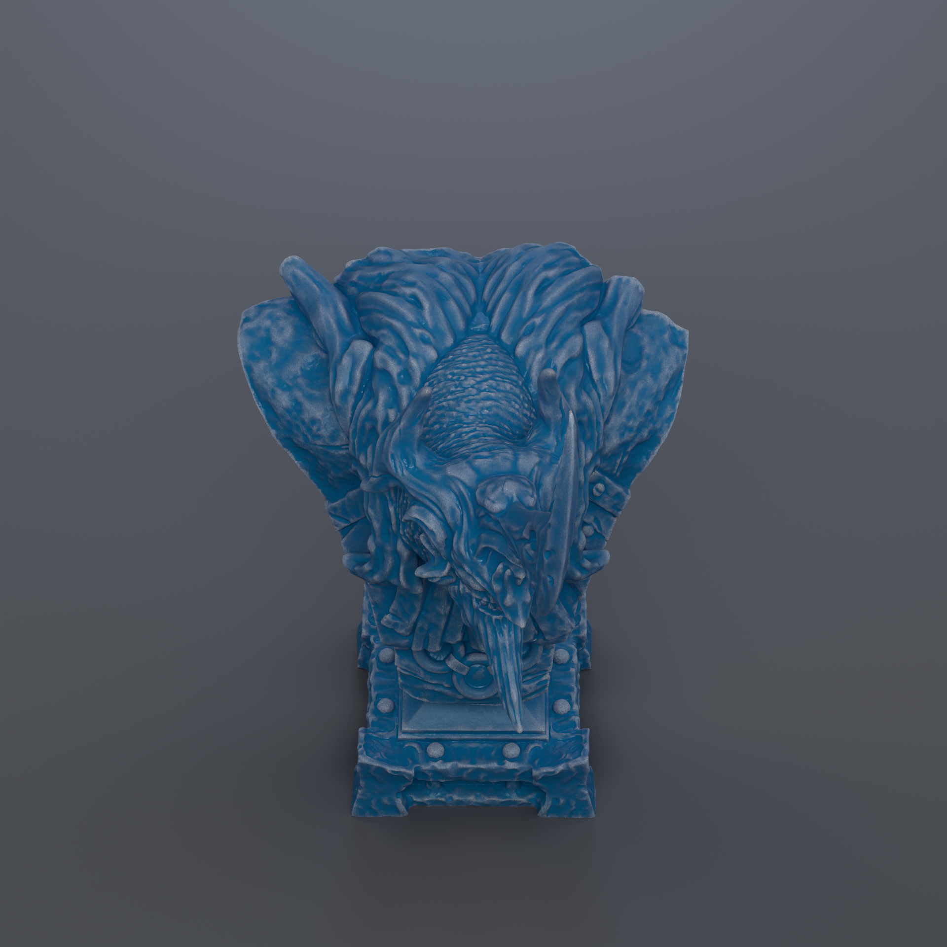 A blue, sculpted statue of a dragon-like creature with intricate details and a fierce expression.
