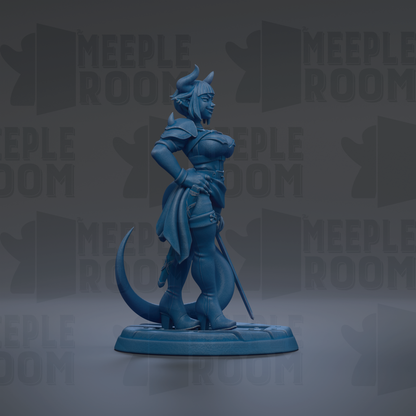 A blue figurine of a woman with horns, standing on a platform and holding a sword.
