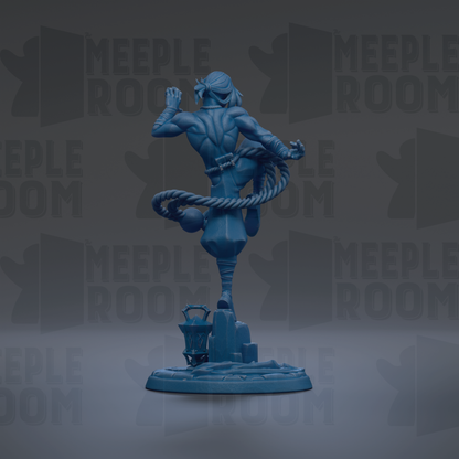 A blue statue of a person in a fighting stance, with a rope around their waist and a lantern in front of them, against a dark background with repeated text.