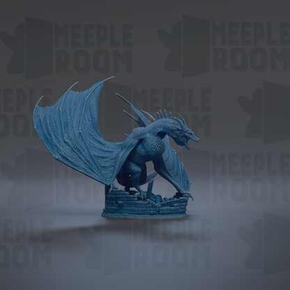 A blue dragon figurine with outstretched wings is the central focus of the image.