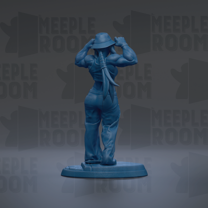 A blue figurine of a muscular woman with a hat and a sword stands in front of a repeating pattern of the word "MEUPLE ROOM".