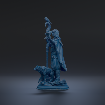 A blue statue of a man with a bird perched on his head, standing next to a wolf.
