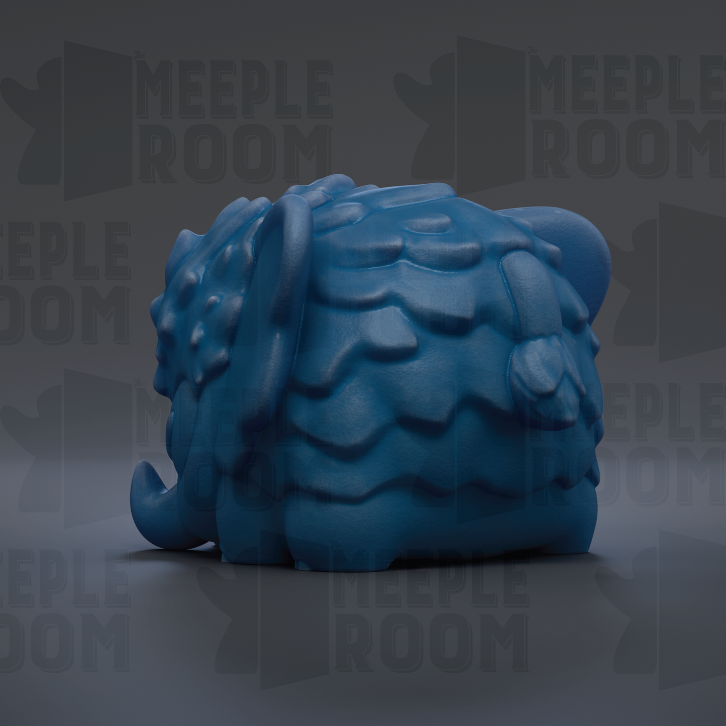 A blue, wavy-textured toy resembling a small elephant or animal figure is shown against a dark background with repeated text.