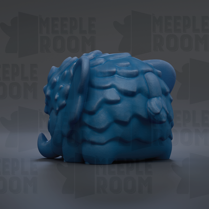 A blue, wavy-textured toy resembling a small elephant or animal figure is shown against a dark background with repeated text.