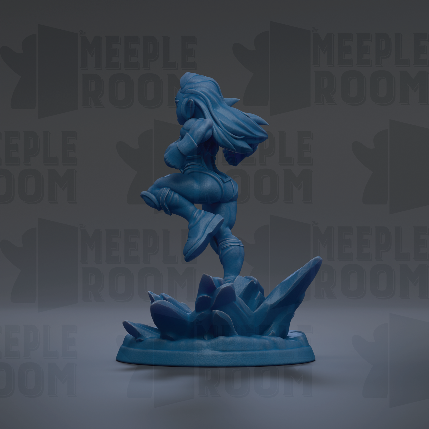 A blue figurine of a person in a dynamic pose, standing on a base with a rock formation.