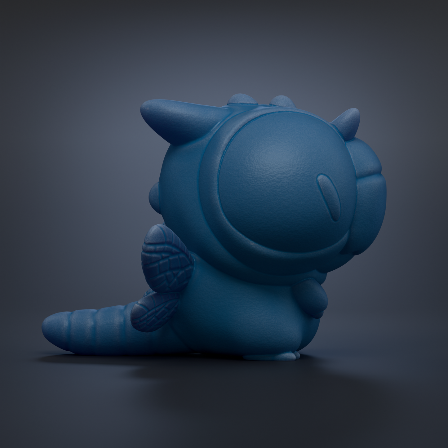 A blue, cartoon-like creature with a large head and small body is depicted in the image.