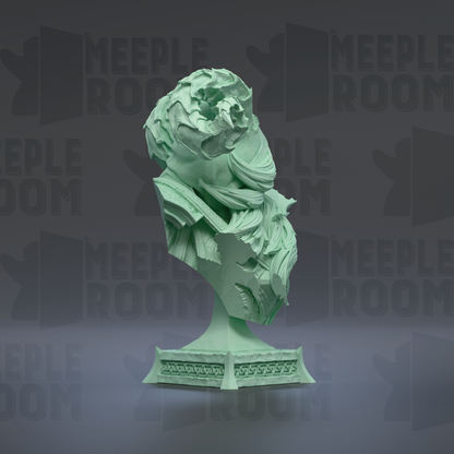 a green bust sculpture with a textured, abstract design.