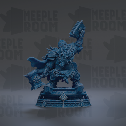 A blue statue of a warrior figure holding a shield and sword, standing on a pedestal.