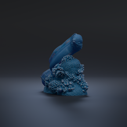 A blue, abstract sculpture resembling a fish or sea creature is shown against a dark background.