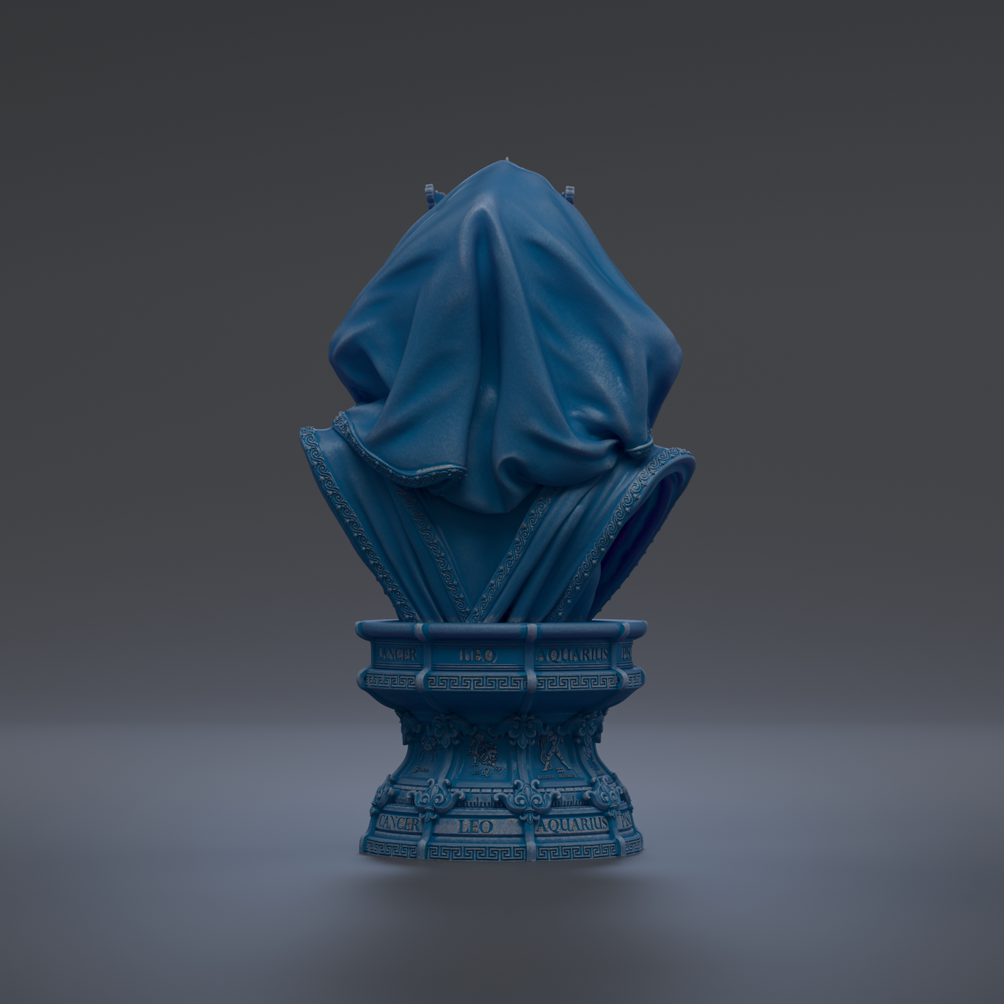 A blue bust sculpture with a draped cloth covering the top, standing on a pedestal with various texts and symbols.