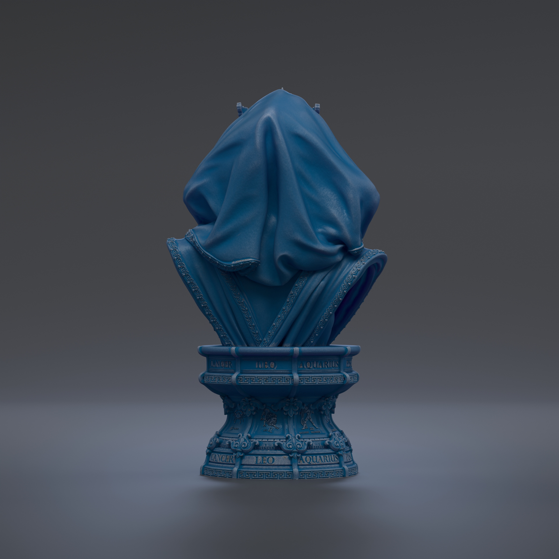 A blue bust sculpture with a draped cloth covering the top, standing on a pedestal with various texts and symbols.