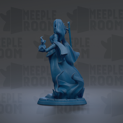 A blue figurine of a woman with long hair and a flowing dress, holding a small object, is the central focus of the image.