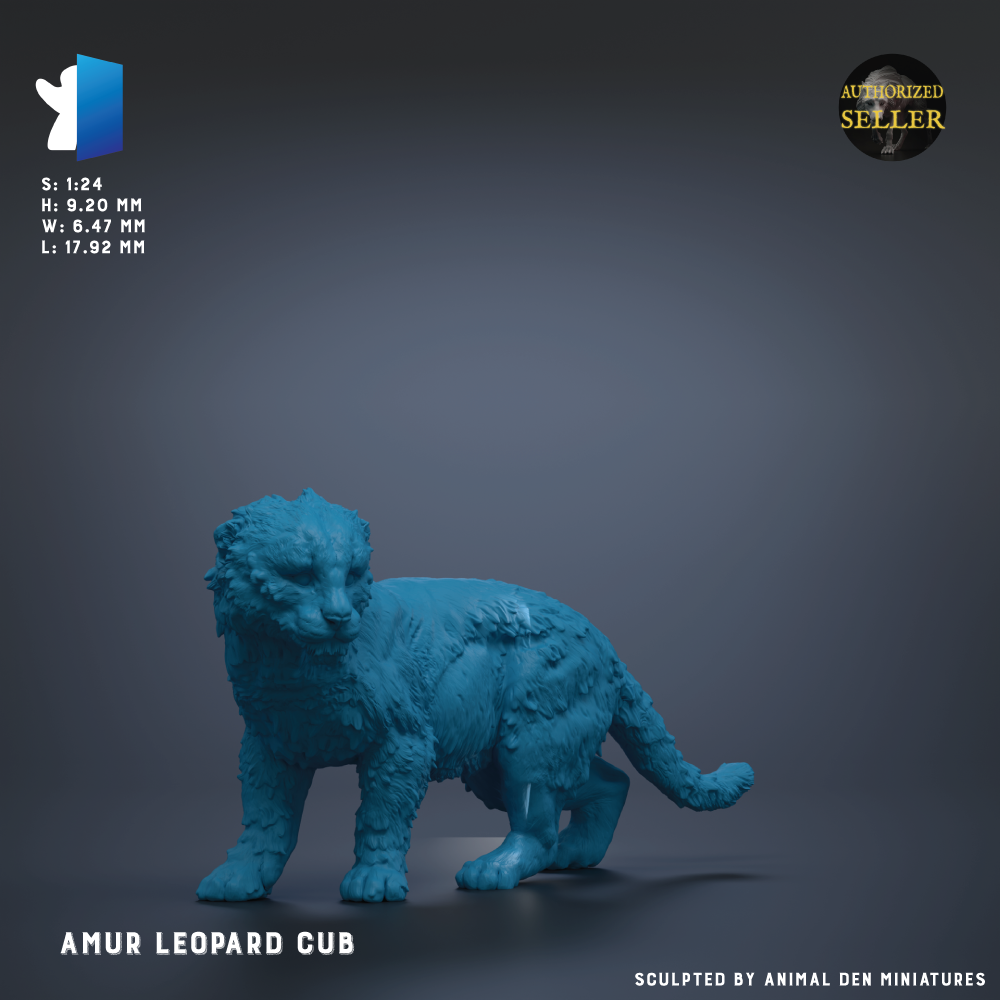 a blue figurine of a leopard cub, which is a small, toy-like representation of a real leopard cub.