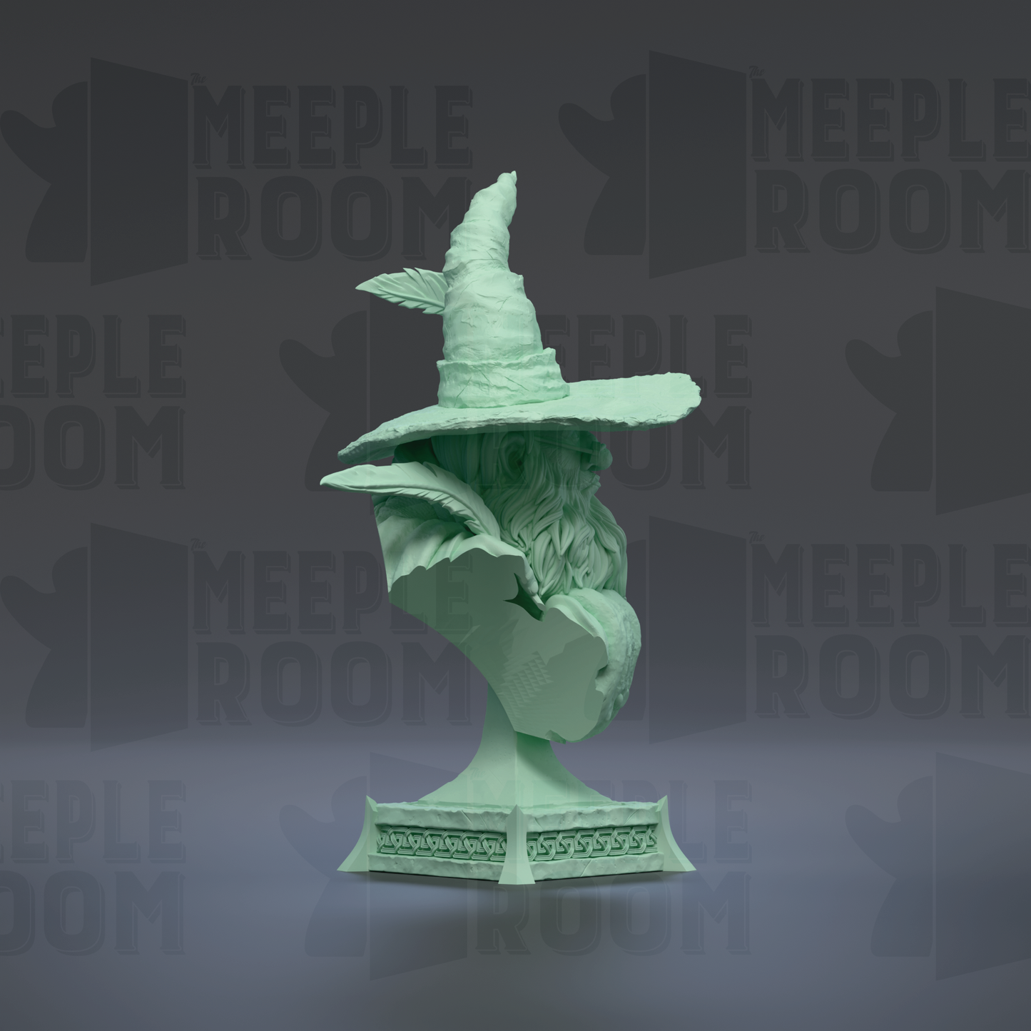 A green statue of a wizard wearing a pointed hat, standing on a pedestal.