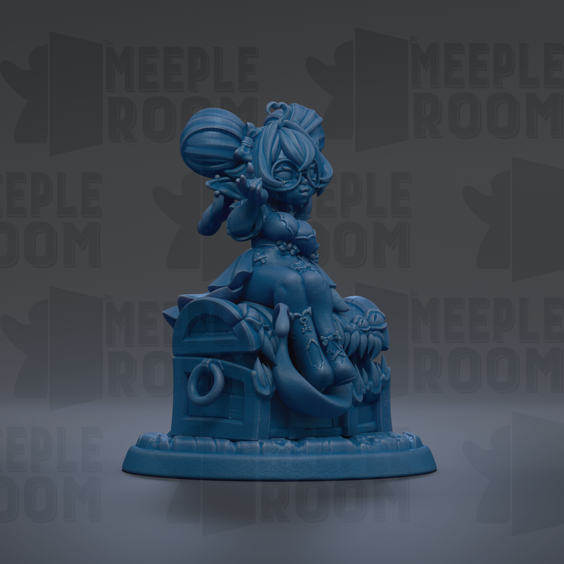 A blue figurine of a person sitting on a chest, with a crown on their head, is the main focus of the image.