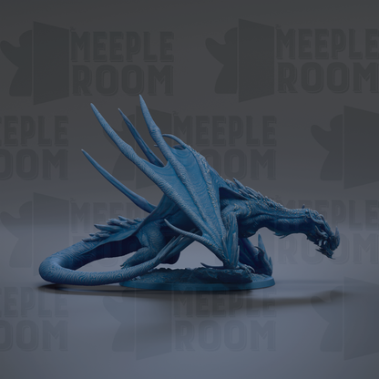 A blue dragon figurine is shown in the image, with its wings spread wide and its mouth open, appearing to be in a dynamic pose.