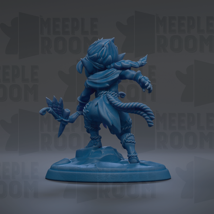 A blue figurine of a character with a sword and shield, standing on a base and facing away from the camera.