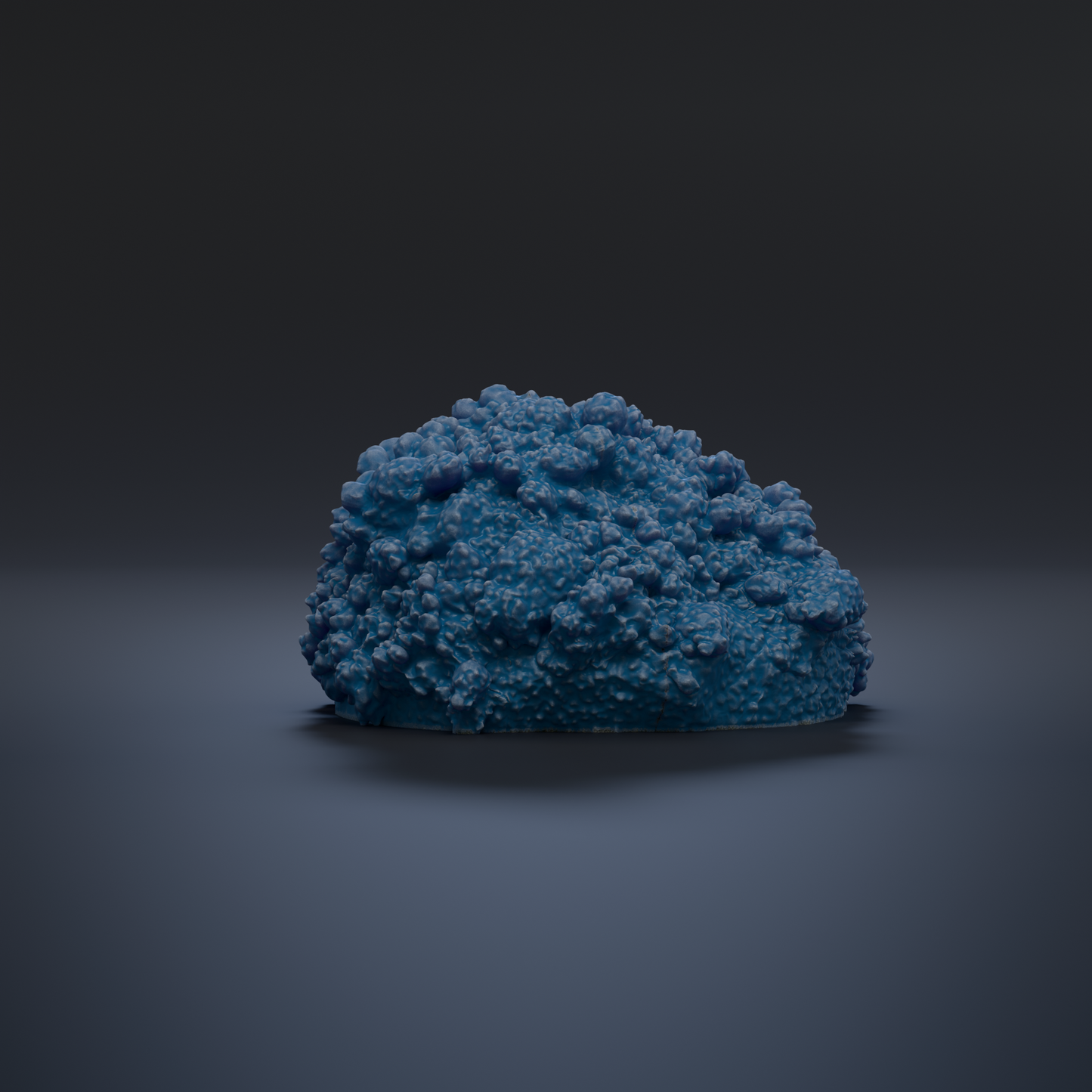 A large, blue, rocky formation resembling a mountain or rock formation is the central focus of the image.