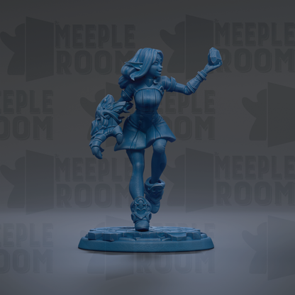 A blue figurine of a woman with long hair and a sword, standing on a platform and holding a shield.