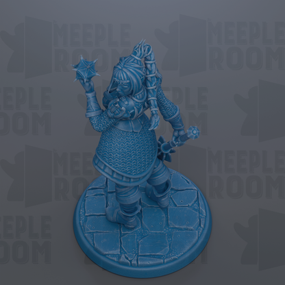 A blue figurine of a character with a star-like weapon, standing on a stone base.