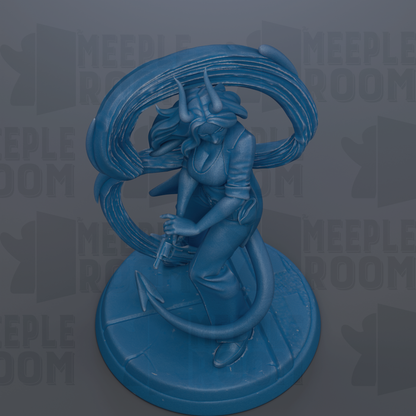 A blue statue of a woman with horns, holding a weapon, standing on a pedestal.