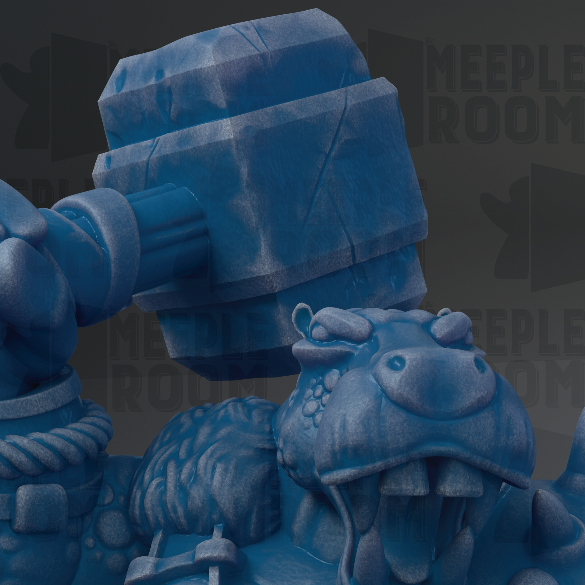 A close-up view of a blue, textured sculpture depicting a large, angular hammer-like object with a snarling expression.