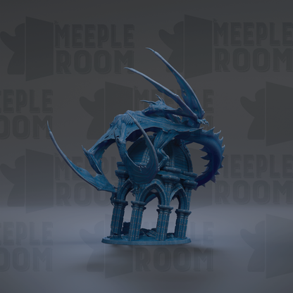 A blue dragon statue with sharp teeth and claws, standing on a pedestal-like structure.