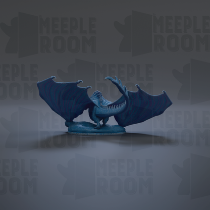 A blue dragon figurine with wings spread, sitting on a surface against a dark background with repeated text.