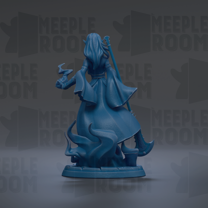 A blue figurine of a woman with long hair and a flowing dress, holding a staff, is shown against a dark background with repeated text.