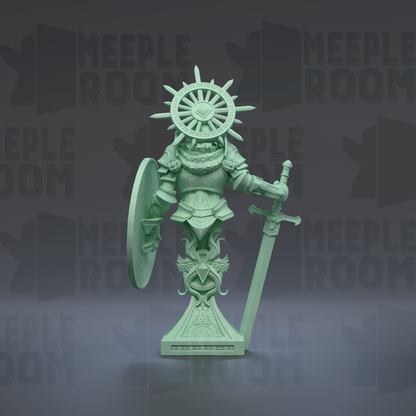 A green statue of a knight holding a shield and sword, standing on a pedestal with a large wheel above it.