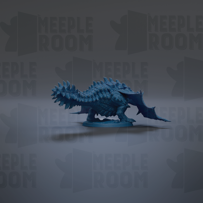 A blue, spiky-scaled dragon figurine is the central focus of the image, set against a dark background with repeated text.