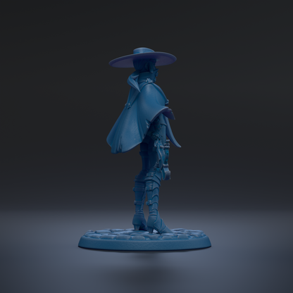 A blue figurine of a person wearing a hat and holding a weapon, standing on a circular base against a dark background.