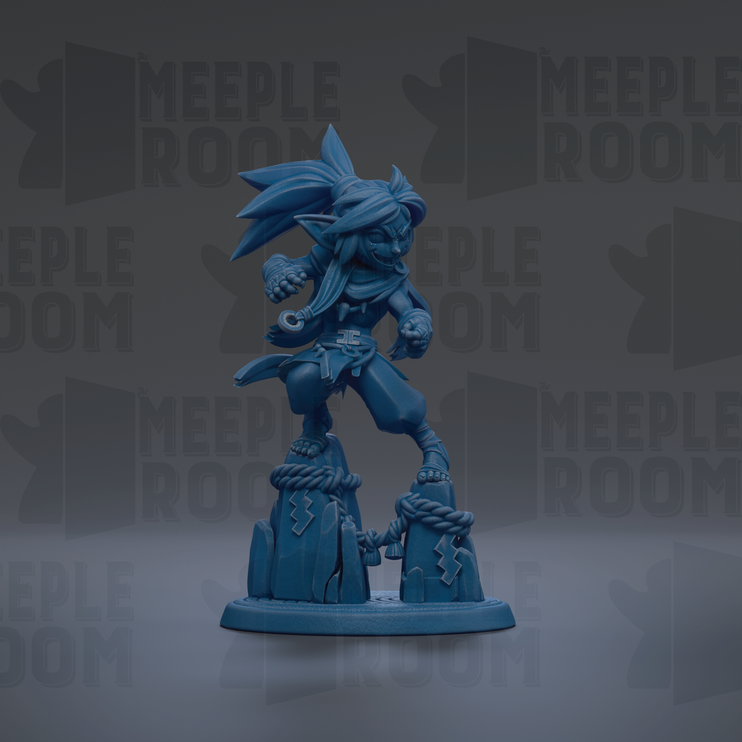 A blue figurine of a character with a large head and long hair, standing on a rock formation.