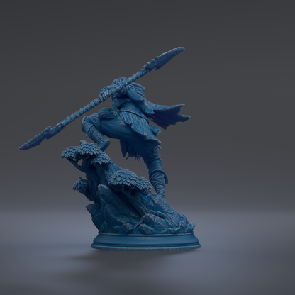 A blue statue of a warrior wielding a spear and shield, standing on a rocky outcrop against a dark background.
