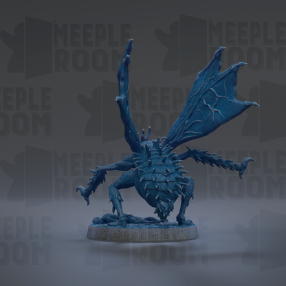 A blue, winged creature with sharp claws and fangs is depicted in the image.
