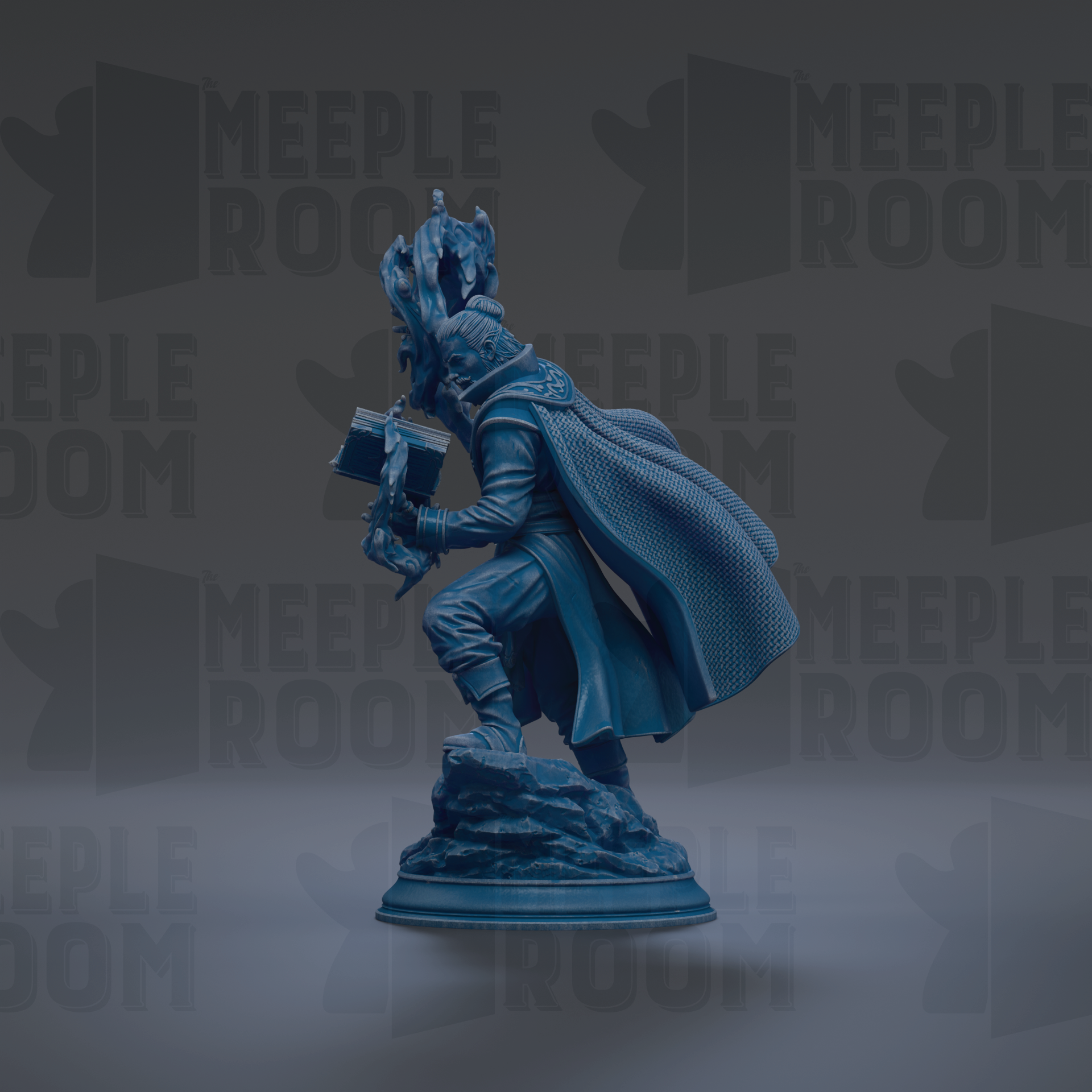 A blue statue of a person holding a book and standing on a rock.