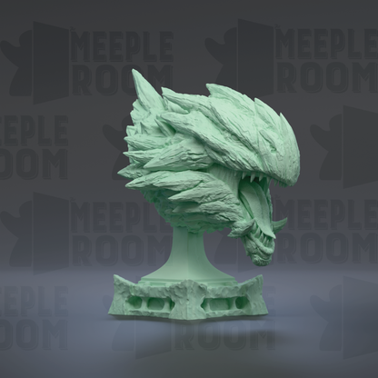 A green, sculpted dragon head is displayed on a pedestal against a dark background with repeated text.