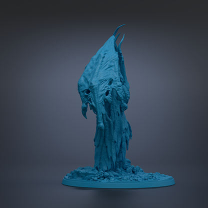 A dark blue, sculptural figure with a pointed head and sharp teeth stands on a small base against a dark background.