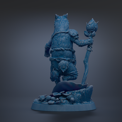 A blue, 3D-rendered statue of a wolf-like creature standing on a rock formation with mushrooms and other natural elements.