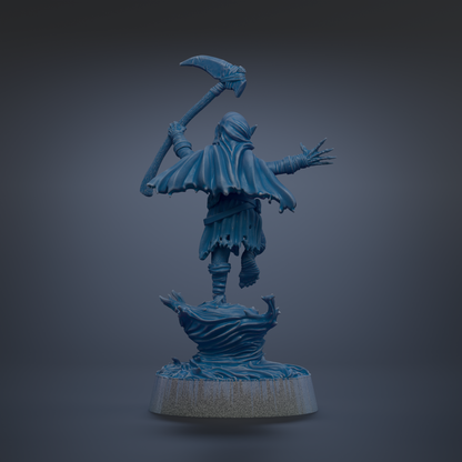 A blue figurine of a person holding a large weapon, standing on a rock formation against a dark background.