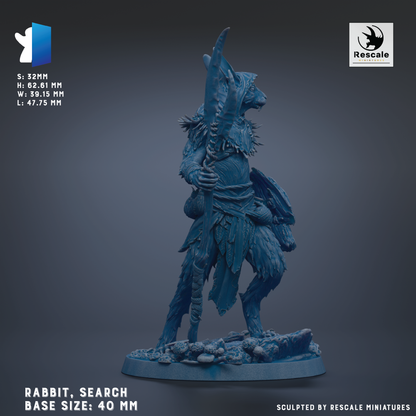 A blue figurine of a rabbit-like creature with a long, curved weapon, standing on a rocky base.