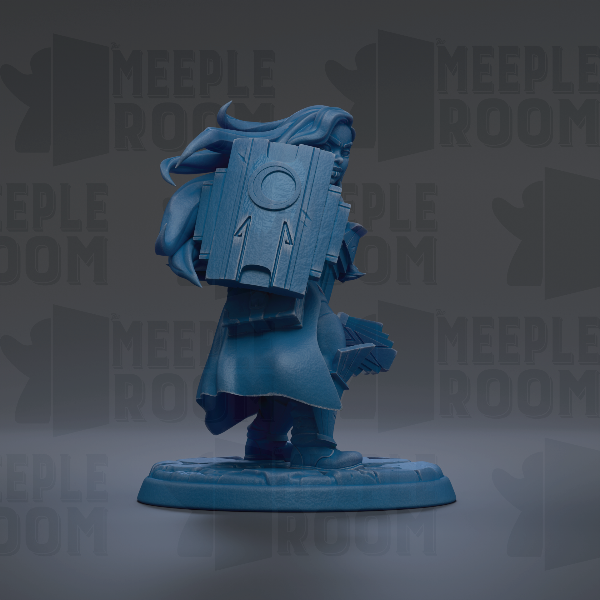 A blue figurine of a person with long hair, wearing a cape, standing on a base and holding a shield.