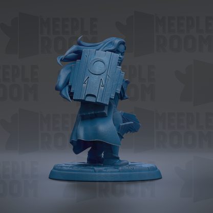 A blue figurine of a person with long hair, wearing a cape, standing on a base and holding a shield.