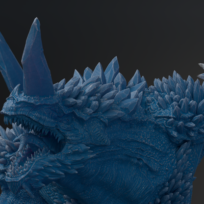 A close-up view of a blue, icy dragon sculpture with sharp teeth and spikes, set against a dark background.