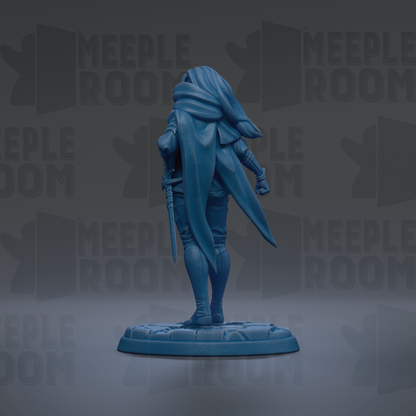 A blue figurine of a person standing on a base, with a cape and a sword in their hands.