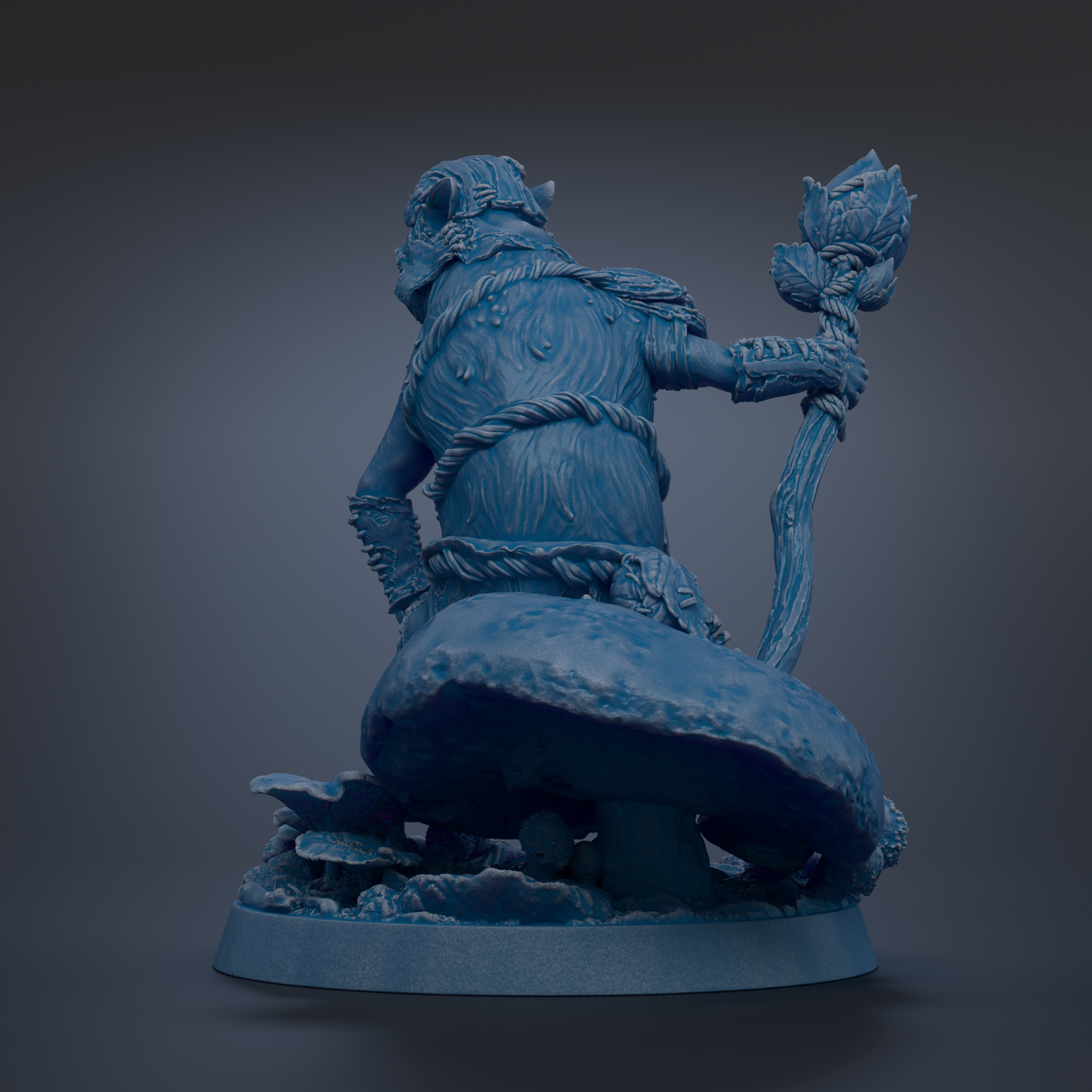 A blue, 3D-rendered statue of a fantastical creature sitting on a mushroom-like base, holding a staff-like object.