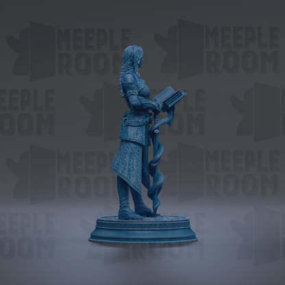 A blue statue of a woman holding a book and standing on a pedestal.