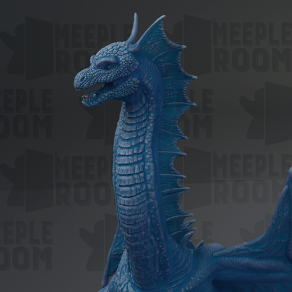 A close-up of a blue dragon statue with a textured, detailed appearance.