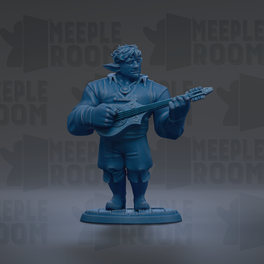 A blue figurine of a person playing a guitar.