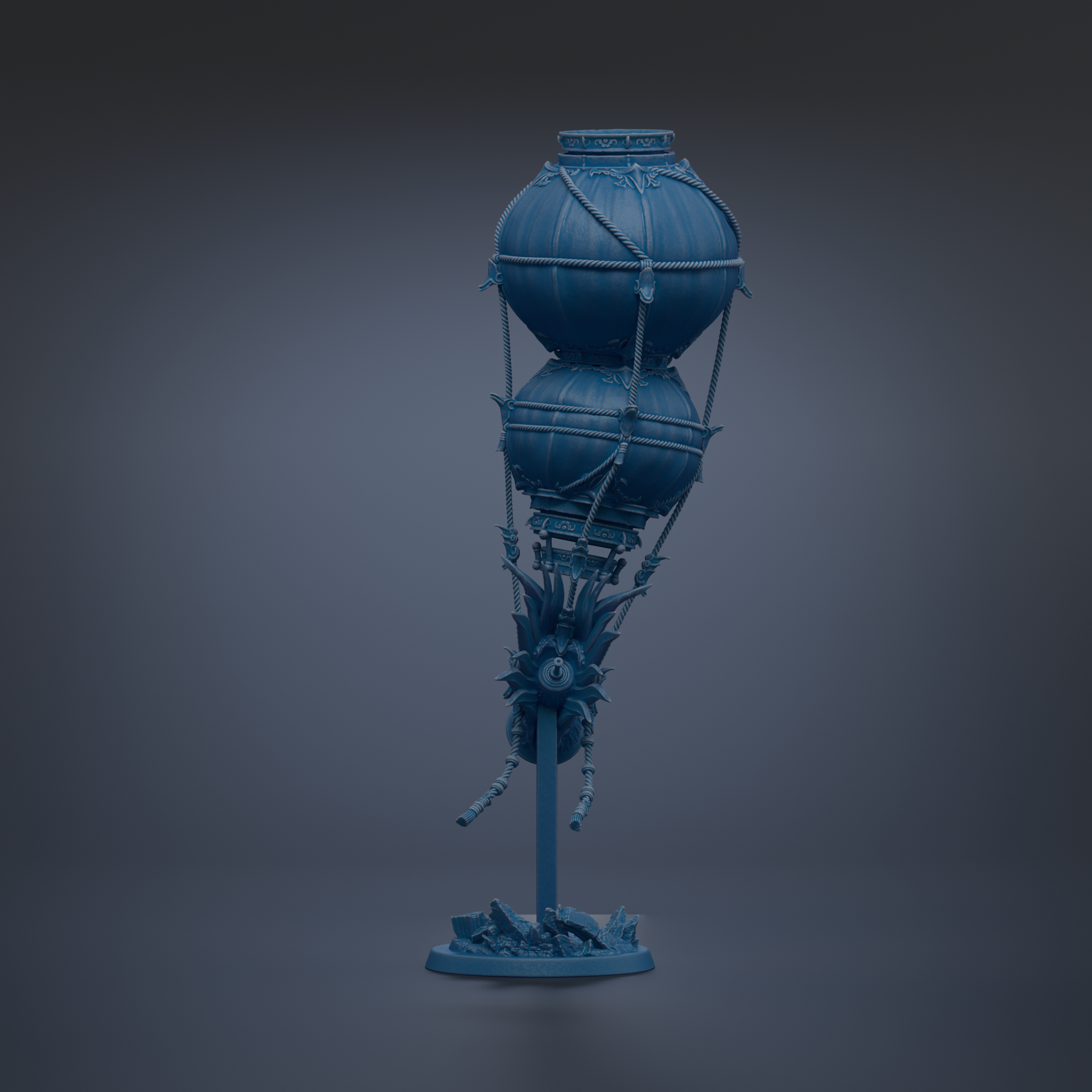 A blue, spherical object with a unique, intricate design, resembling a sculpture or a decorative piece.